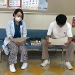修了後も指導を受けるK君。